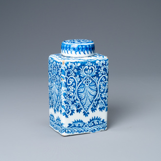 A Dutch Delft blue and white tea caddy with screw cap, late 17th C.