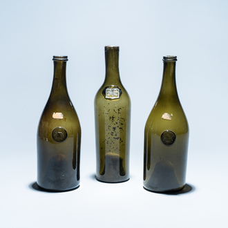 Three green glass wine bottles with crowned seals, 18/19th C.