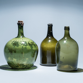 Three large green glass bottles, 18th C.