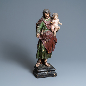 A polychromed wooden figure of Saint Joseph with child, 2nd half 17th C.