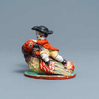 Une boîte couverte en forme d'un garçon sur un oiseau en faïence de Delft polychrome, 18ème