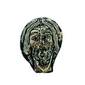 Un fragment roman en verre peint représentant le visage de Christ, France, 11/12ème