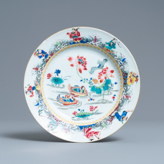 A Chinese famille rose plate with mandarin ducks in a lotus pond and immortals, Yongzheng