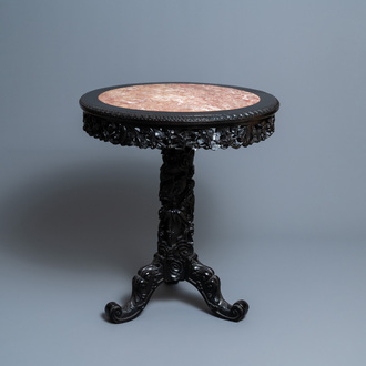 Une table en bois sculpté au plateau en marbe, Chine, 19ème