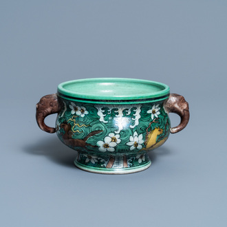 A Chinese verte biscuit 'flaming horses' censer, Jiajing mark, 18/19th C.