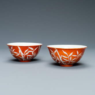 A pair of Chinese 'bamboo' coral red-ground bowls, Xuantong mark, Republic