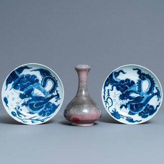 A pair of Chinese blue and white 'dragon' plates and a monochrome copper-red vase, Kangxi and later