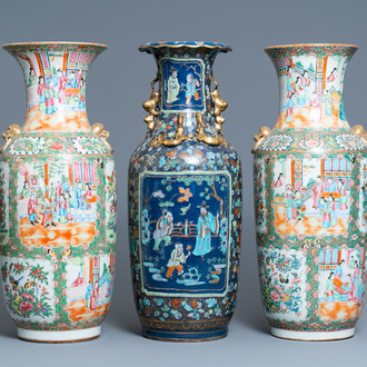 A pair of Chinese Canton famille rose vases and a blue-ground vase, 19th C.