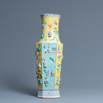 A Chinese famille rose vase with applied 'antiquities' design, 19th C.