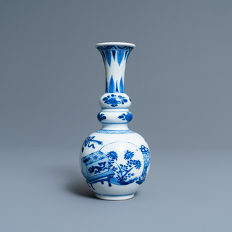 A Chinese blue and white triple gourd 'antiquities' vase, Kangxi