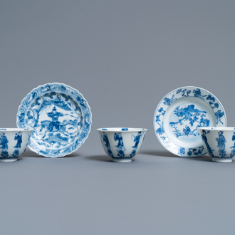 Three Chinese blue and white cups and two saucers, Kangxi