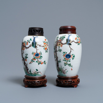 A pair of Chinese famille verte jars with birds among blossoming branches, Kangxi