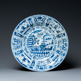 A large Chinese blue and white kraak porcelain dish with figures in a landscape, Wanli