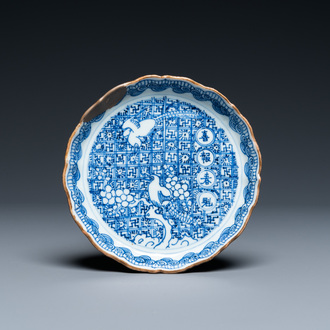 A Chinese blue and white shonzui ko-sometsuke dish with birds and calligraphy, Chongzhen