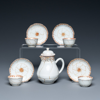 Four Chinese iron-red and gilt cups and saucers and a covered jug, Yongzheng/Qianlong