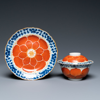 A Chinese iron-red, gilt and blue and white covered bowl on stand, 19th C.