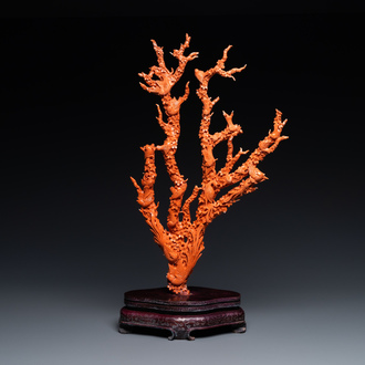 A large Chinese carved red coral group with birds on floral branches, 19/20th C.