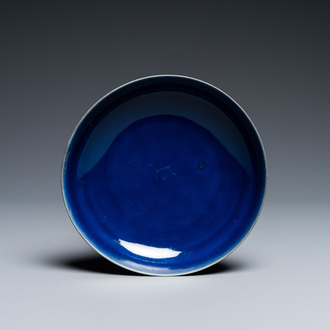 A Chinese monochrome blue dish, Qianlong mark and of the period