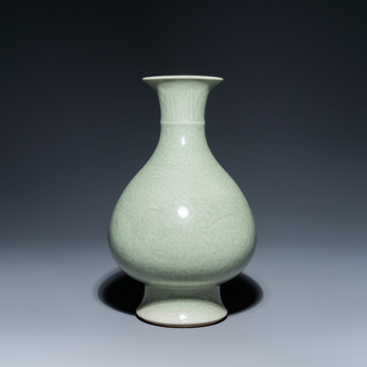 A Chinese monochrome celadon-glazed 'yuhuchunping' vase with underglaze floral design, Kangxi mark, 19th C.