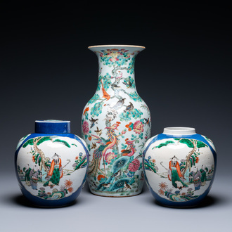 A Chinese famille rose vase and a pair of famille verte powder blue-ground jars, 19th C.