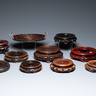 A varied collection of Chinese wooden stands and a silver-mounted tray, 19/20th C.