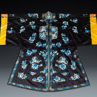 A Chinese 'forbidden stitch' embroidered silk ladies robe with flowers and butterflies, 19th C.