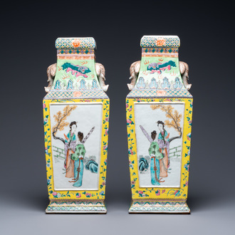 A pair of Chinese famille rose elephant head-handled vases, 19th C.