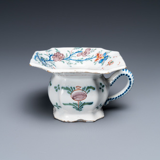 A polychrome Dutch Delft spittoon, 18th C.