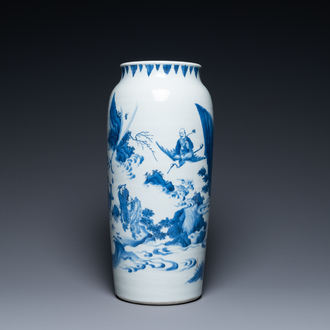 Un vase en porcelaine de Chine en bleu et blanc à décor d'Immortels dans un paysage, époque Transition