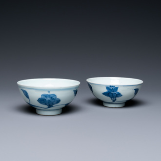 A pair of Chinese blue and white 'palace' bowls, Yongzheng mark and of the period