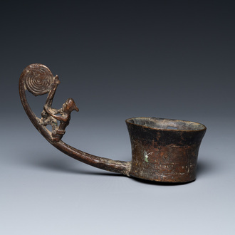 A Vietnamese bronze ladle depicting a musician, Dong Son, ca. 5th/2nd C. BC