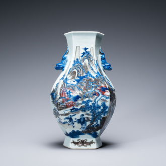 A Chinese blue, white and copper-red 'mountainous landscape' vase, 19th C.