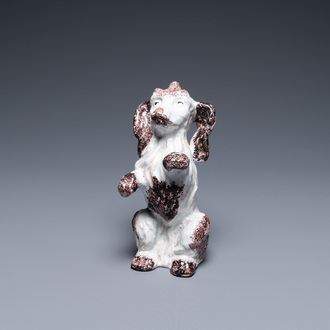 A Brussels faience manganese and white dog, 18th C.