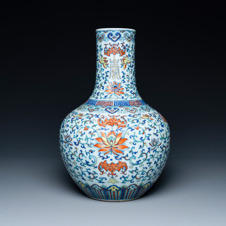 A Chinese doucai 'lotus scroll' bottle vase, Qianlong mark, 18/19th C.