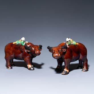 A pair of Chinese verte biscuit groups of boys riding buffaloes, Kangxi