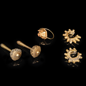 Three Vietnamese golden earrings, Champa, 14th C. and a pair of later Chinese gilded earrings, 18/19th C.