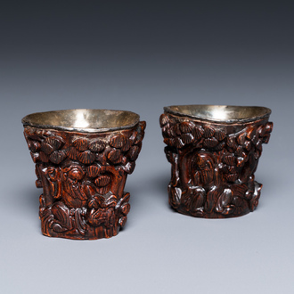 A pair of Chinese silver-lined coconut wine cups, Ming