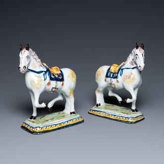 A pair of polychrome Dutch Delft horses, 18th C.