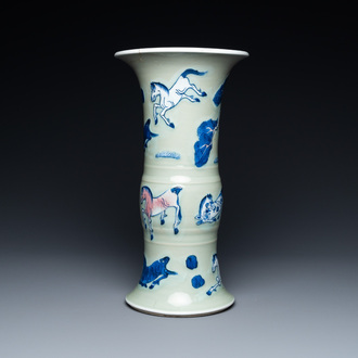 Un vase en porcelaine de Chine en bleu, blanc et rouge de fer à fond céladon à décor des 'Huit chevaux de Mu Wang', Kangxi