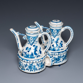 A Dutch Delft blue and white cruet set on stand, 18th C.