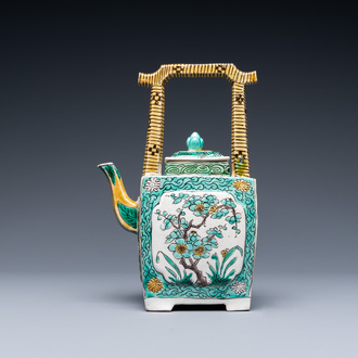 A Chinese verte biscuit teapot and cover, Kangxi