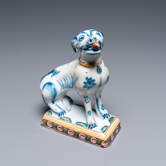 A polychrome Dutch Delft dog, 18th C.