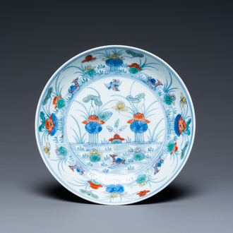 A Chinese doucai 'mandarin ducks' plate, Chenghua mark, 18/19th C.