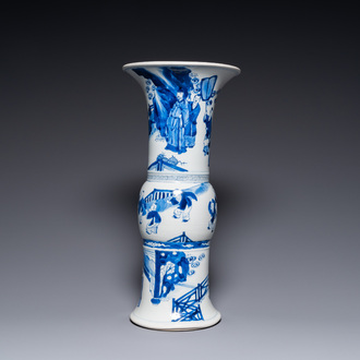 Een Chinese blauw-witte 'gu' vaas met figuratief decor, Kangxi