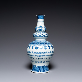 A Chinese blue and white triple gourd vase, Jiajing mark, Qing