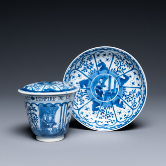 A Chinese blue and white covered cup and saucer for the French market, Kangxi