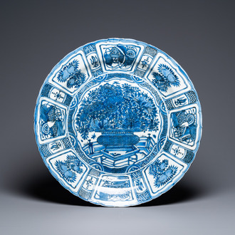 A large Chinese blue and white kraak porcelain dish with a finely painted jardinière, Wanli