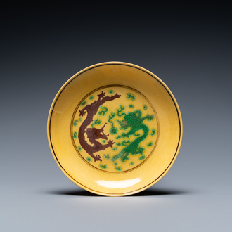 A Chinese yellow-ground aubergine- and green-glazed 'dragon' dish, Guangxu mark and of the period