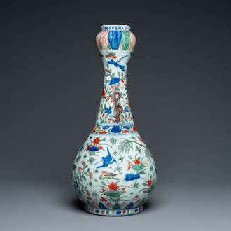 A Chinese wucai garlic-mouth bottle vase, Wanli mark and of the period