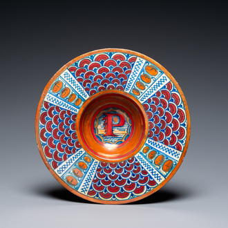 An Italian maiolica lustre-glazed dish monogrammed 'P', Gubio, workshop of Maestro Giorgio, 1st quarter 16th C.